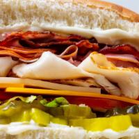 (25) Classic Club · Turkey, ham, bacon, cheddar & Swiss cheese, lettuce, tomato, pickles, pepperoncini & mayonna...
