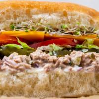 Tuna · Tuna mixed with diced onion, relish & mayo, cheddar cheese, lettuce, tomato, pickles & mayon...