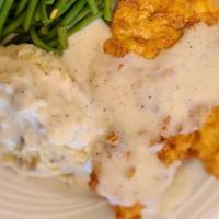 Chicken Fried Chicken · Hand battered boneless chicken breast,fried and topped with Homemade cream gravy or our spic...