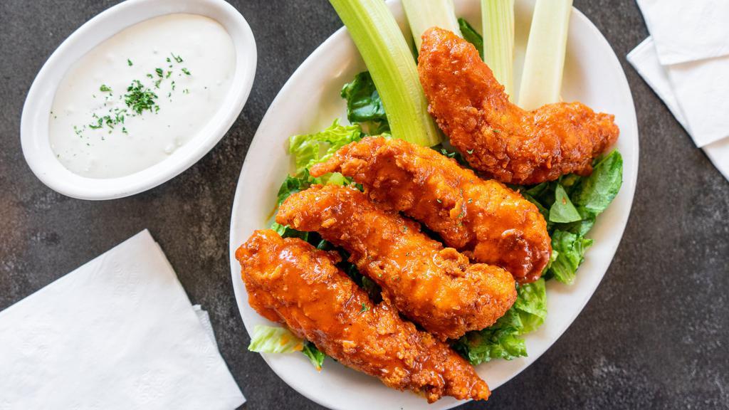 Buffalo Style Chicken Fingers · Lightly breaded tenders tossed with our spicy Chipotle Buffalo Sauce, topped with Bleu Cheese crumbles and served with fresh celery sticks and your choice of dipping sauce.