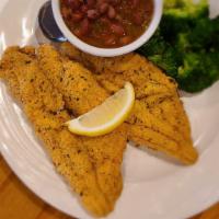 Crispy Fried Catfish · Two tender farm-raised fillets, hand-battered and fried to a crispy golden brown.