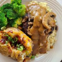 Char-Broiled Chopped Steak · Half pound Premium Angus beef, cooked medium well served on rice.  Topped with Brown Gravy a...
