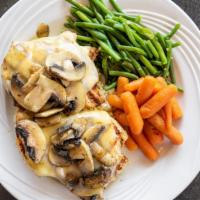 Mushroom Swiss Chicken · Two grilled chicken breasts topped with melted Swiss cheese and sauteed mushrooms, served on...