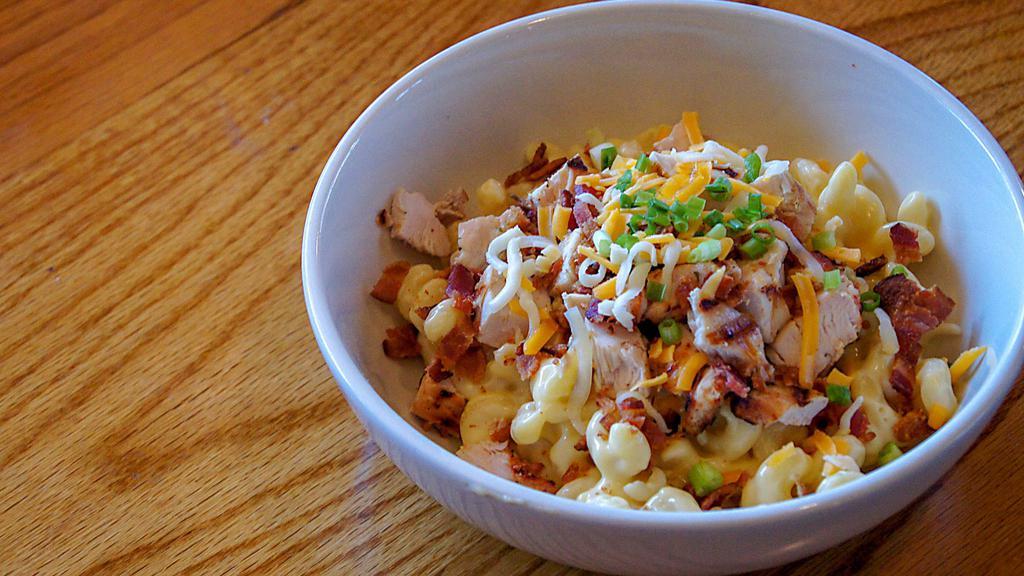 Chicken Bacon Mac & Cheese · Creamy mac & cheese topped with marinated grilled chicken, bacon, mixed cheese and sprinkled with shaved parmesan cheese