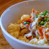 Buffalo Mac & Cheese · Creamy mac and cheese topped with marinated grilled chicken, bleu cheese crumbles and drizzl...