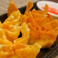 Crab Wonton · Deep fried wontons with real crab meat and cream cheese stuffing served with homemade sweet ...