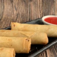 Egg Rolls · Deep fried vegetables egg rolls served with homemade sweet sauce.