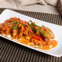 Choo Chee Soft-Shell Crab · Lightly battered soft-shell crab with spicy Thai coconut curry paste topped with shredded li...