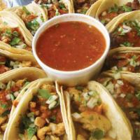 Taco Party Pack · 12 Tacos, Asada. Chcken or Carnitas, Rice, Beans Chips and Salsa. Must give at least one hou...