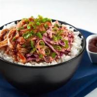 Low & Slow Bbq Pulled Pork Rice Bowl° · American BBQ classic: BBQ pulled pork with jasmine rice, spicy coleslaw and scallions.