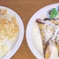 Fr Toast N Eggs · two slices of texas french toast with two eggs & hash browns