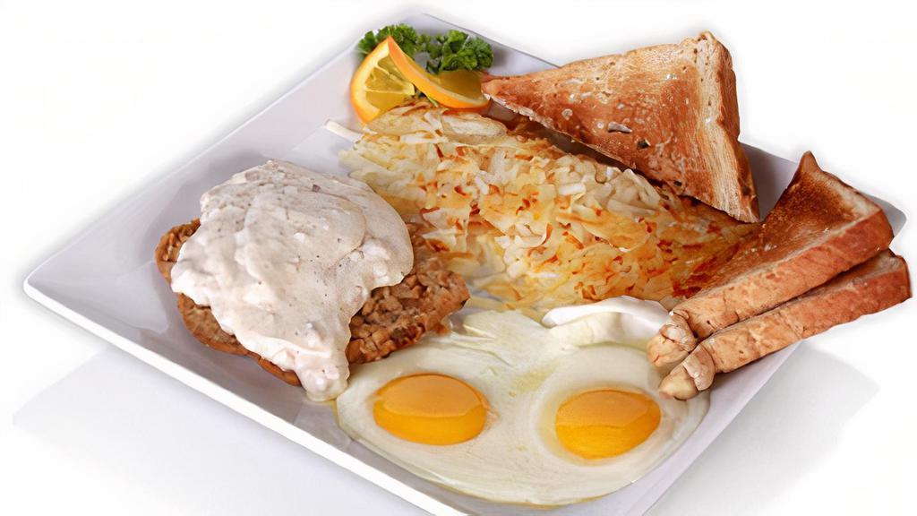 Chicken Fried Steak · chicken fried steak smothered with country sausage gravy / two eggs* / hash browns / choice of toast