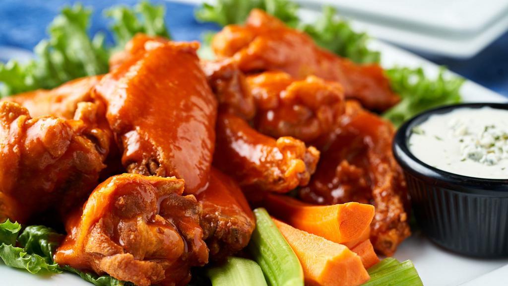 Hot Wings · Jumbo wings tossed with a spicy buffalo or BBQ sauce and served with blue cheese dressing.