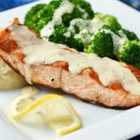 Grilled Salmon · Grilled Scottish salmon in a white wine lemon butter sauce with homemade mashed potatoes and...