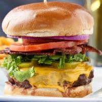 American Burger · Favorite. A half pound of our award winning black Angus beef, topped with American cheese, c...