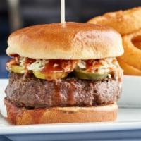 Dallas Burger · A half pound of our award winning black Angus beef, topped with dill pickles, BBQ Sauce, and...