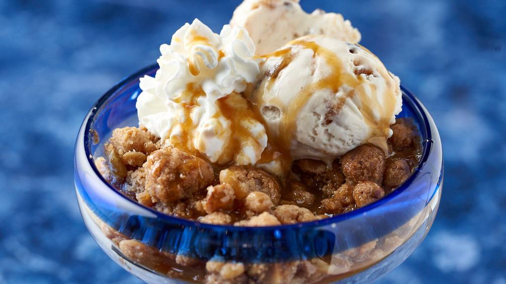 Caramel Gingered Apple Crisp · Nuts. Caramel gingered apple crisp topped with caramel sauce and whipped cream. Add vanilla gelato for an additional charge.