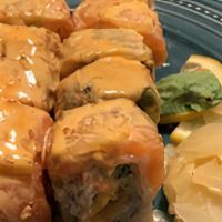 Seahawks Roll · Shrimp tempura, crab meat, cucumber, topped with salmon, avocado, lemon, honey mango sauce, ...