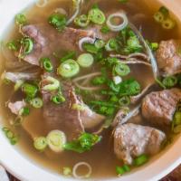 Cowabunga Pho / Phở Đặc Biệt · Beef broth served with rice noodles, rare steak, lean brisket, and beef meatballs.

*Consumi...
