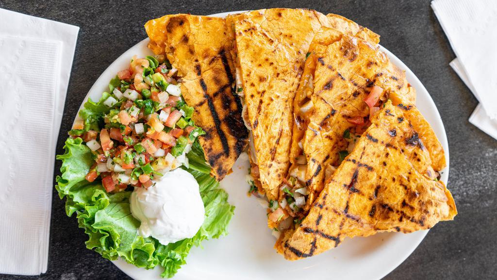 Quesadillas · Grilled Chipotle tortilla filled with Cheddar, Monterey Jack cheese and Pico de Gallo. Served with your choice of dipping sauce.