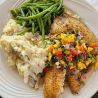 Grilled Tilapia With Sweet Mango Salsa · Two tender fillets, lightly seasoned, grilled and topped with our freshly made Sweet Mango S...