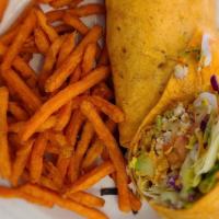 Southwest Chicken Wrap · Grilled or fried chicken with fresh avocado slices, Romaine lettuce, Cheddar cheese, Montere...