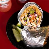 Burritos · All burritos are wrapped in a warm flour tortilla and packed with cabbage slaw, seasoned ric...