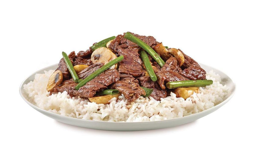 Mongolian Beef · Wok-seared beef, mushrooms, garlic, green onion in a soy-based sauce served on steamed rice