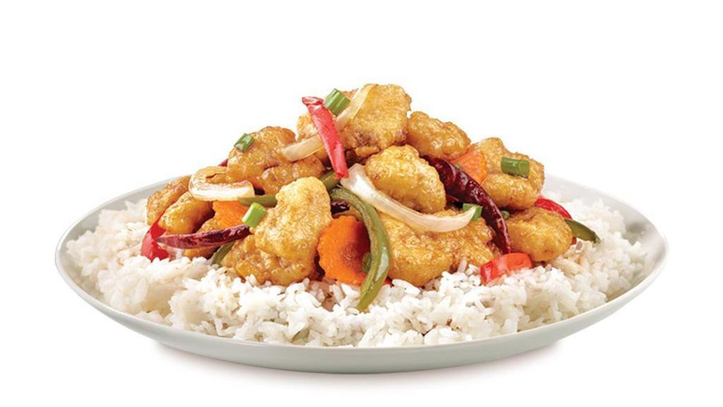 Kung Pao Chicken · Battered chicken, red and green peppers, carrots, sliced onions, red chilies, green onions in a spicy sweet and sour sauce served on steamed rice