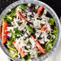 Gus'S House Salad · Crispy lettuce, tomatoes, onions, black olives, mozzarella, green peppers, mushrooms.