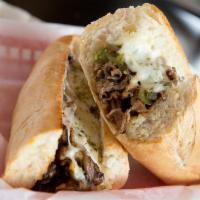 Philly Cheesesteak · Sautéed onions, mushrooms, and green peppers.