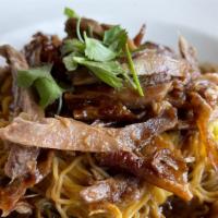 Duck Noodle  · Egg noodles, bok choy, grilled duck topped with special  house sauce.