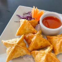 House Crab Rangoon (5) · 5 pieces house-made deep fried wontons stuffed with crab meat and cream cheese served with s...