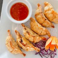 Gyoza (6) · 6 pieces deep fried chicken pot stickers served with sweet chili sauce.