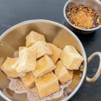 Fried Tofu (Gf, Vg) · Deep fried OTA tofu served with house sweet and sour sauce and roasted ground peanuts.