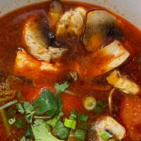 Tom Yum Soup (Gf) · House sweet & sour soup; tomato, mushroom, onion, cilantro.