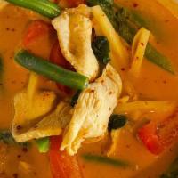 Red Curry  (V)(Gf) · House red curry with bamboo, green beans, bell peppers, basil served with a side of white rice