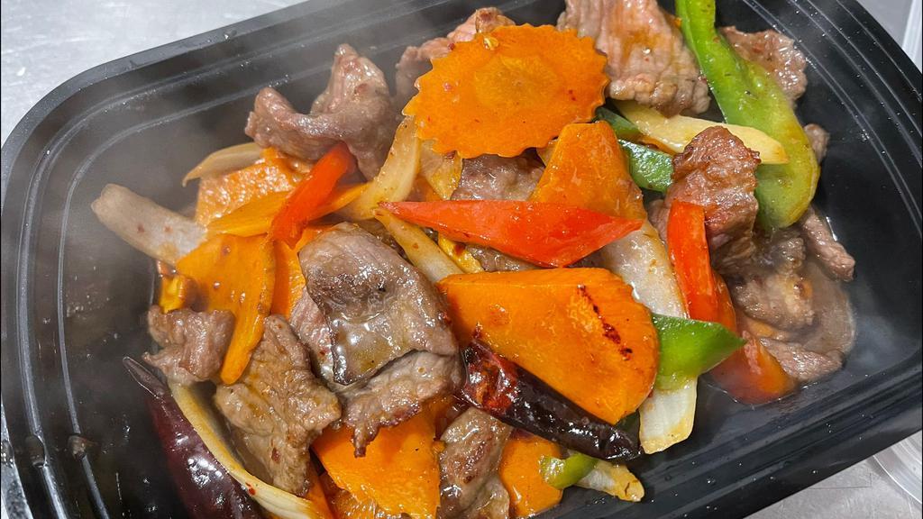 Cashew Nuts · Dried chilies, green onion, yellow onion, carrots,  bell pepper, cashew nuts, garlic, white pepper served with a side of white rice - substitute brown rice +$1