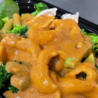 Pra Ram (V)(Gf) · Spinach, broccoli, topped with peanut sauce. (Gluten Free) served with a side of white rice ...