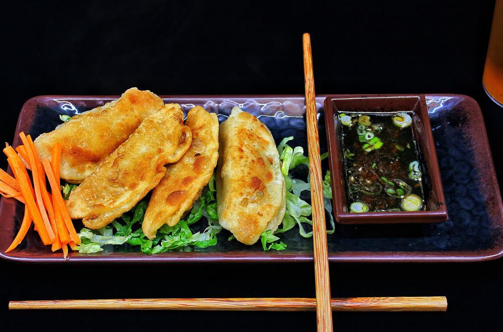 Pot Stickers - 5Pcs. · Chicken and vegetable. Serve with homemade dipping soy sauce.