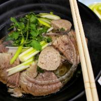 House Specialty Pho · Ribeye, meatball, brisket.

Consuming raw or undercooked meats, poultry, seafood, shellfish,...