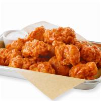 Boneless Wings (30 Pieces) · Tender all-white chicken, lightly breaded and cooked to a golden crisp. Handspun in your fav...