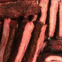 St Louis Spare Ribs · Spicey and delicious. Order enough for leftovers. Cooked slow and low like all our meats. Th...