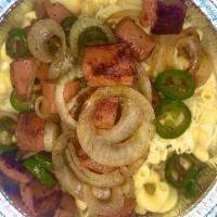 Ballpark Mac · Cavatappi pasta tossed in white Cheddar cheese sauce, topped with chopped all beef hotdog, g...