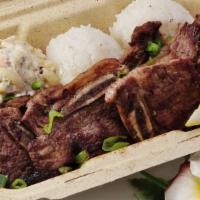 Pulehu Ribs Plate Lunch · Tender, seasoned, grilled short ribs topped with green onions and a fresh lemon slice.
GFI* ...