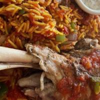 Kabsa · A traditional Bedouin dish of your choice of meat, rice, sautéed diced onions, bell pepper, ...