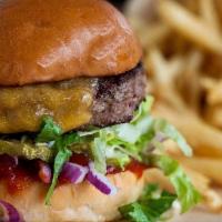 Cheeseburger · 1/4lb of cascade natural beef, tillamook cheese, shredded lettuce, red onion, pickles and ca...