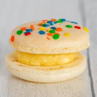 Mexican Vanilla French Macaron · An art pallet full of color with a rich vanilla french buttercream.