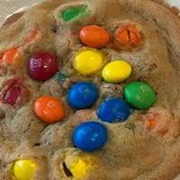 M&M Explosion · Soft batch brown sugar cookie dough loaded with M&M's, then topped with more M&M's.