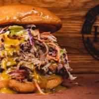 Smoked Carnitas / Pulled Pork Sandwich · A quarter pound of rich pulled pork, crispy tangy coleslaw, and our Sonoran Honey Mustard BB...
